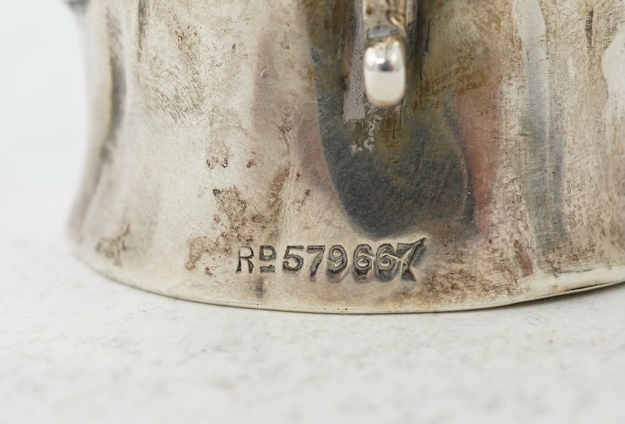 A George V novelty silver cream jug, modelled as a Toby Jug, by Hayes & Co